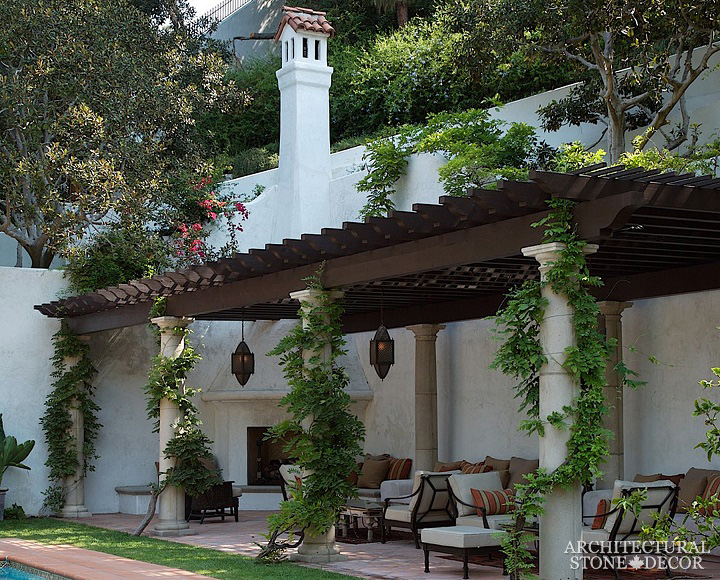 terrace salvaged antique reclaimed limestone natural stone old rustic columns hand carved pergola landscape ideas outdoor design eco-friendly sustainable recycled re-modeled re-used Canada
