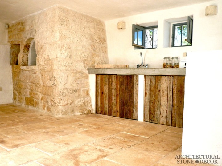 Farmhouse kitchen style with reclaimed limestone flooring