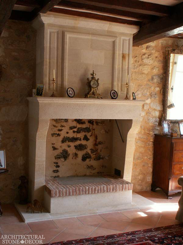 French-country-style-home-villa-living-room-reclaimed-limestone-handcarved-fireplace-mantel-canada-architectural-stone-decor-interior-design-2