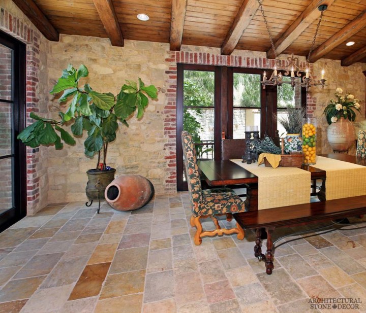 tuscan-dining-room-reclaimed-limestone-flooring-barre-gray-terracota-jars-canada-architectural-stone-decor