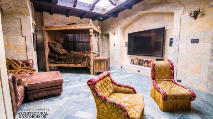 medieval style bedroom reclaimed limestone flooring and wall cladding