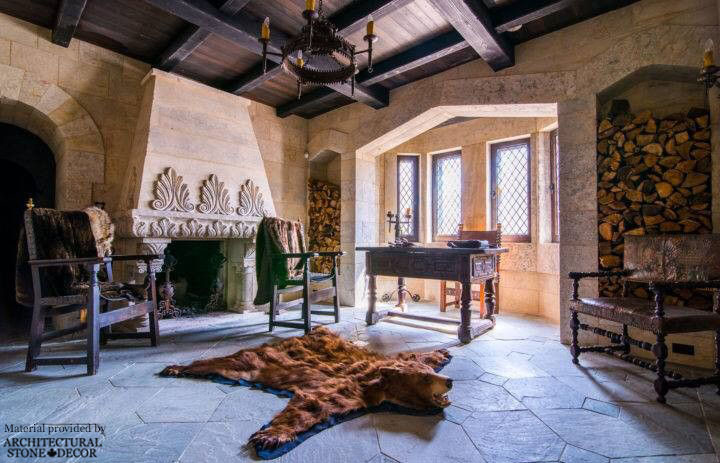 Gothic Medieval interior game of thrones reclaimed limestone rustic wood wrought iron furniture bear rug