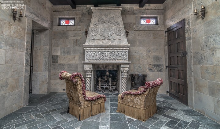 Medieval castle interior reclaimed limestone flooring wall cladding hand carved fireplace mantel