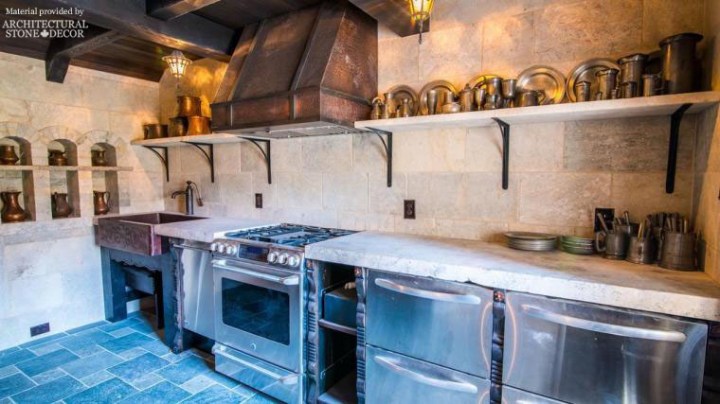Medieval kitchen reclaimed limestone wall cladding niches flooring shelves and butcher blocks for countertops