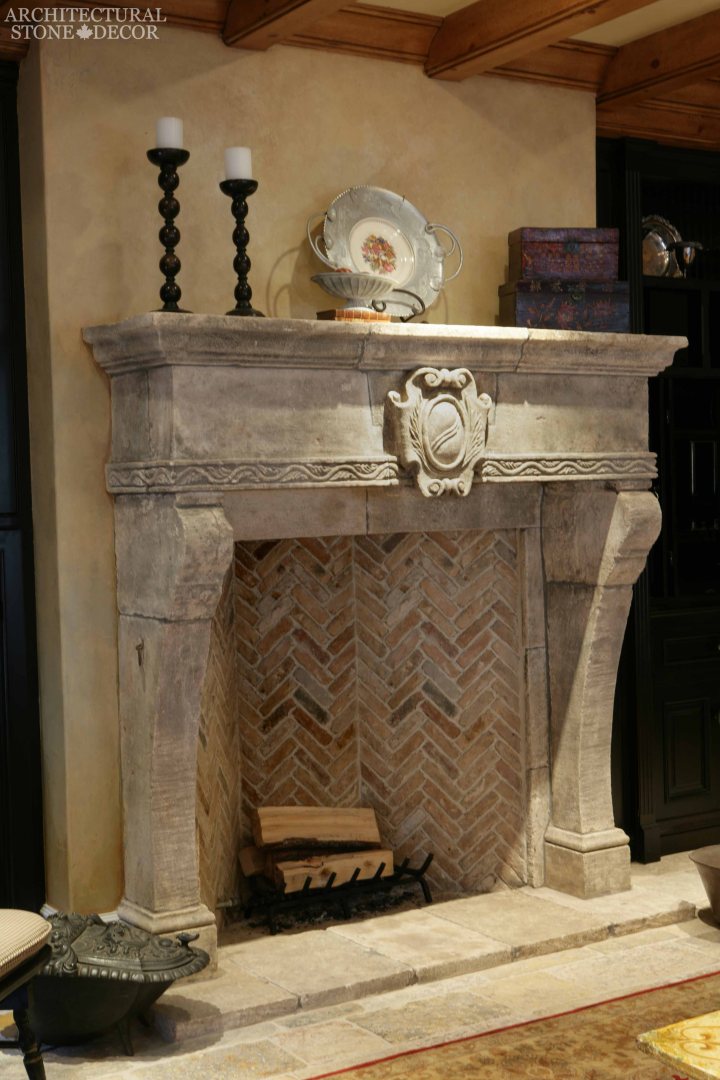 Medieval Gothic Game of Thrones interior style reclaimed ancient rustic hand carved limestone fireplace mantel