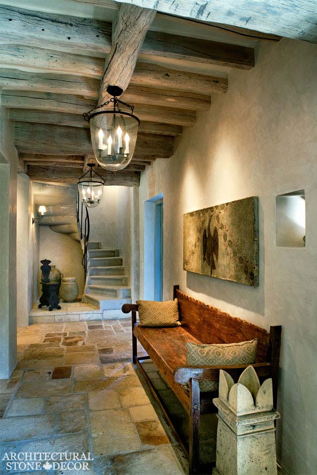 Game of Thrones Medieval Gothic 'Dalle de Bourgogne' reclaimed limestone flooring exposed old wood beams stair steps butcher blocks candle light chandeliers