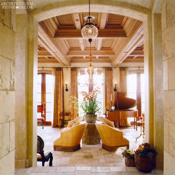 Game of Thrones Dorne Medieval Gothic reclaimed limestone 'Dalle de Bourgogne' flooring and wall cladding and corners exposed wood ceiling shutters column roman cap as table base