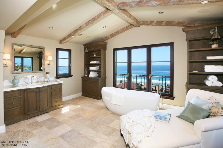 Mediterranean coastal style master bathroom italian marble bathtub Barre Montpelier reclaimed salvaged antique limestone flooring stone pavers Canada Vancouver Toronto