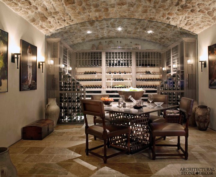 Tuscan style wine cellar/ tasting room cheese and wine Tuscan wall cladding ceiling Barre Montpelier reclaimed salvaged antique limestone flooring stone pavers BC Vancouver Canada