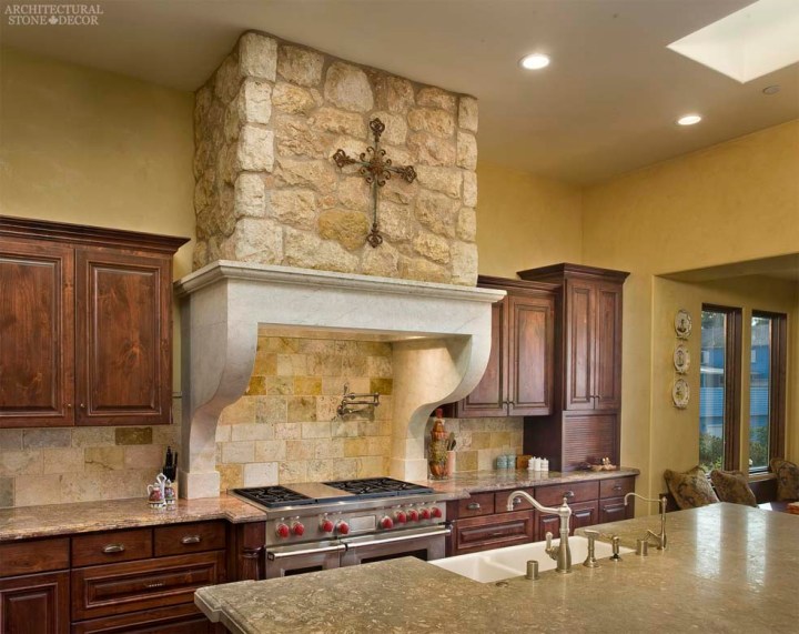 Country style kitchen hand carved reclaimed limestone kitchen hood French Dalle de bourgogne limestone wall cladding Tuscan wall cladding Canada