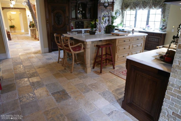 English style open kitchen area Dalle de Bourgogne reclaimed salvaged antique limestone flooring tiles running bond rough finish Canada