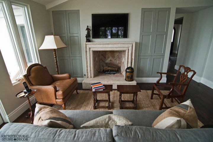 European style living room reclaimed antique salvaged hand carved limestone natural stone fireplace mantel interior design canada UK Australia