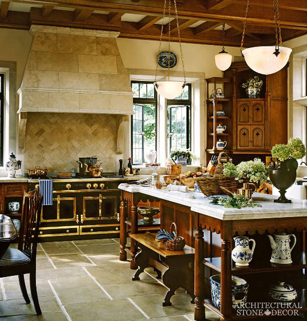French country style reclaimed natrual stone hand carved kitchen hood Dalle de Bourgogne herring bone formation backsplash Barre Blonde flooring Canada