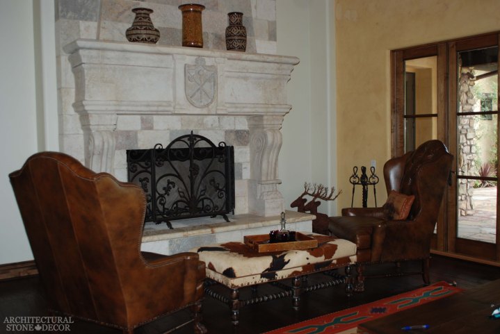 living room reclaimed antique salvaged hand carved limestone natural stone fireplace mantel leather furniture canada UK Australia