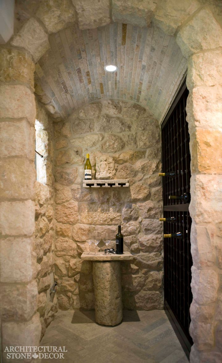 Reclaimed antique salvaged hand carved natural stone limestone old world flooring ceiling Tuscan wall cladding tasting table arch