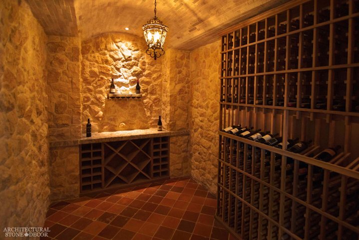 Tuscan style Antique Rustic Old world wine cellar salvaged reclaimed limestone ceiling and flooring and butcher block countertop