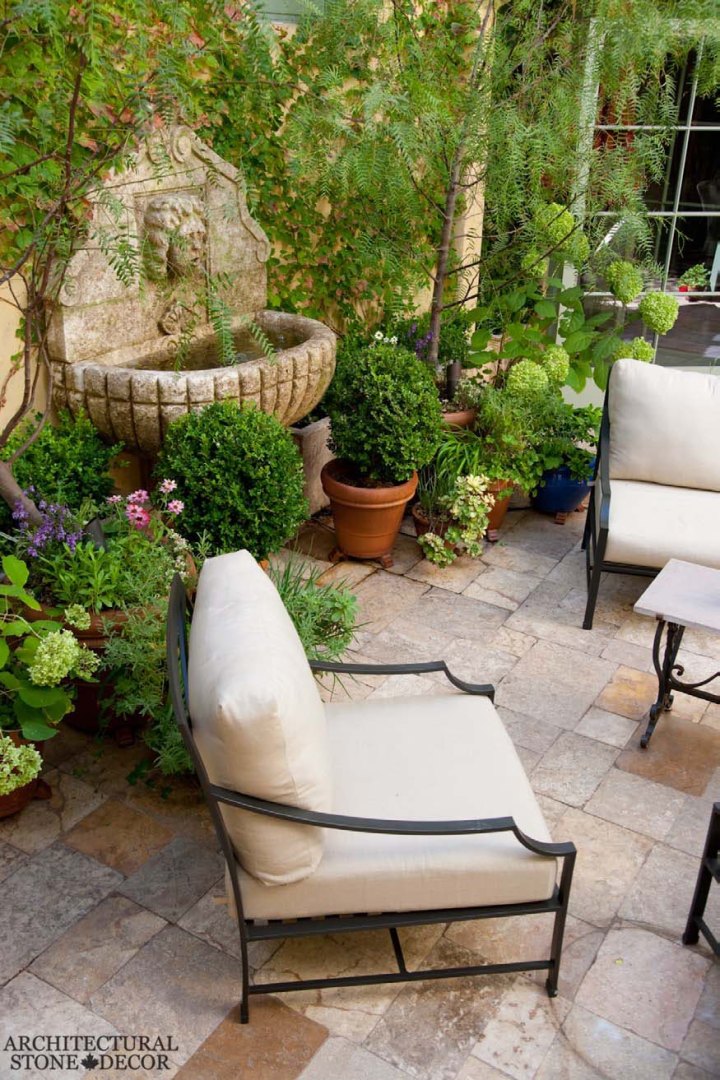 antique old rustic reclaimed old world natural stone hand carved limestone exterior French Provincial outdoor water wall fountain garden design ideas landscape