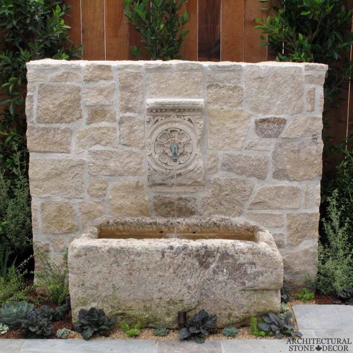 Mediterranean antique old rustic reclaimed old world natural stone hand carved limestone exterior outdoor water wall fountain garden design ideas landscape