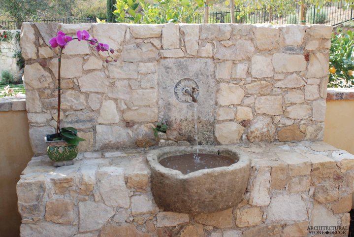 Tuscan antique old rustic reclaimed old world natural stone hand carved limestone exterior outdoor water wall fountain garden design ideas landscape