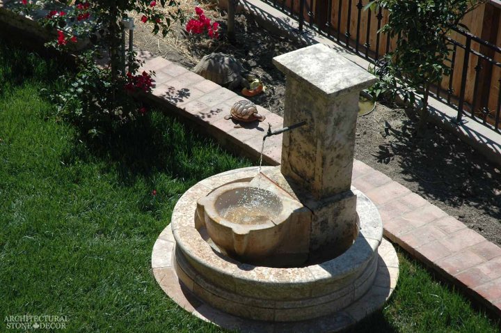 coastal mediterranean antique old rustic reclaimed old world natural stone hand carved limestone exterior outdoor water wall fountain garden design ideas landscape