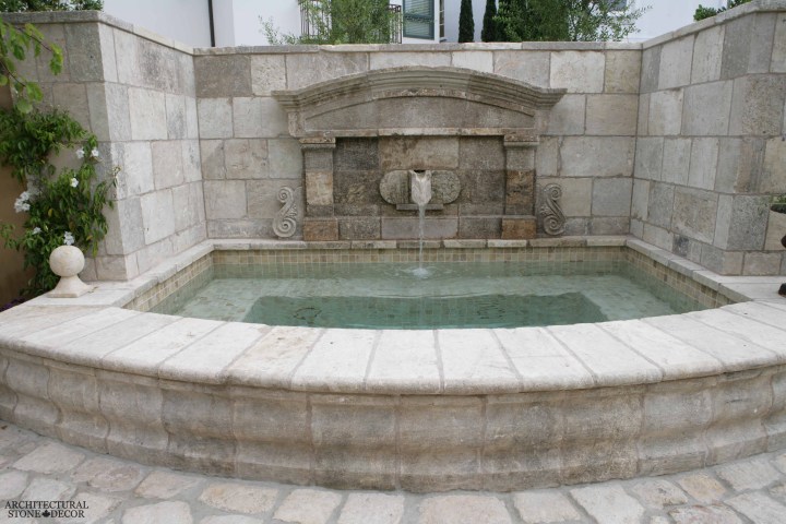 Tuscan style antique old rustic reclaimed old world natural stone hand carved limestone exterior outdoor water wall fountain garden design ideas landscape