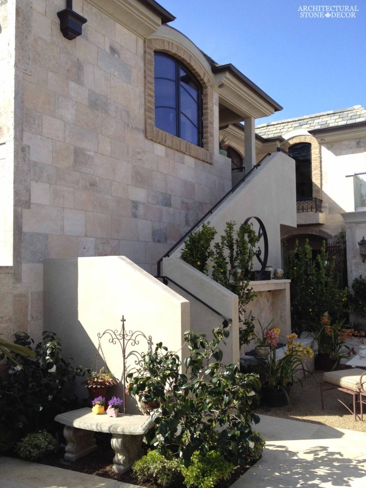 Tuscan Mediterranean style villa Outdoor Exterior natural stone reclaimed rustic old world limestone wall cladding veneer Canada ca