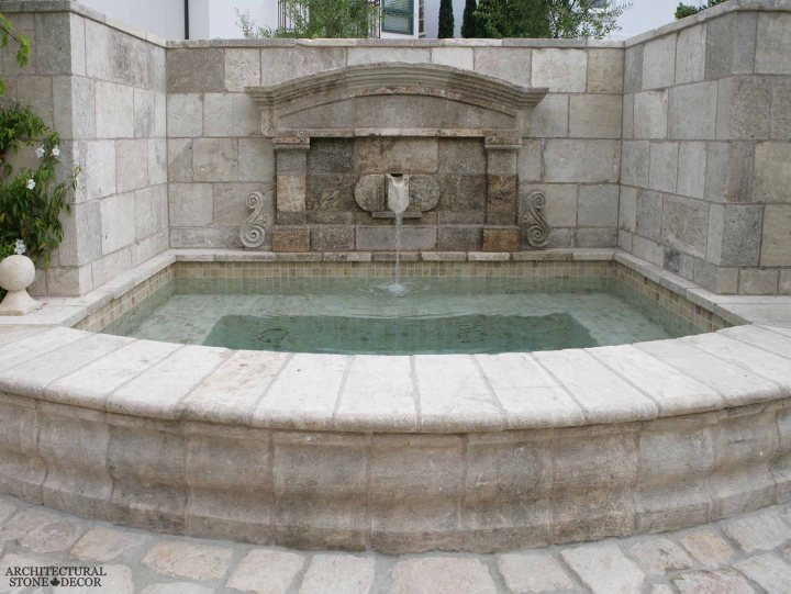 Outdoor Exterior Mediterranean style wall fountain natural stone reclaimed rustic old world limestone wall cladding veneer Canada ca