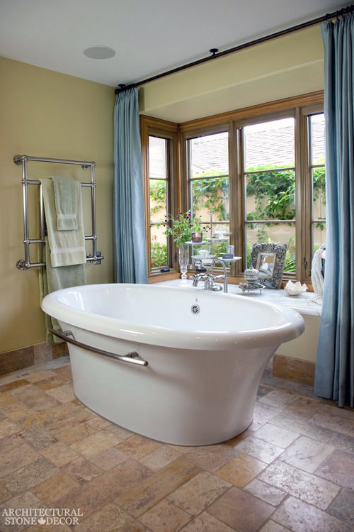 French country style master bathroom reclaimed antiqued limestone natural stone flooring modern canada ca