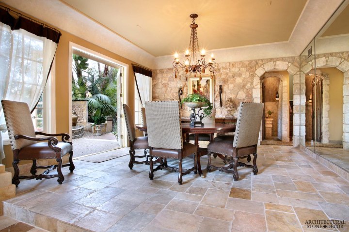 Mediterranean style home reclaimed rustic old natural stone limestone dining room flooring wall cladding canada ca Toronto BC