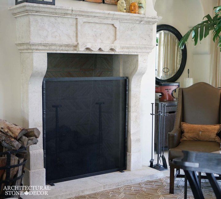 canada toronto vancouver BC CA UK modern neolithic salvaged reclaimed rustic antique natural stone limestone fireplace mantel hand carved living room