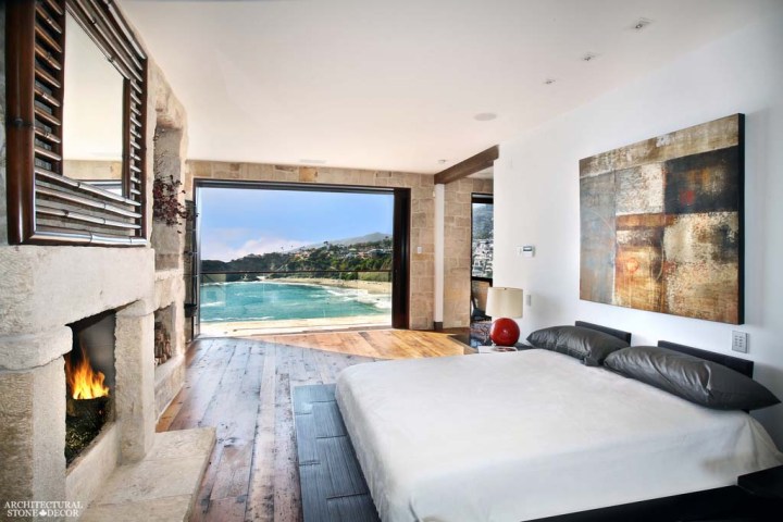canada toronto vancouver BC CA UK coastal Mediterranean style home villa bedroom interior design home décor salvaged reclaimed rustic antique natural stone limestone flooring tiles hand carved fireplace mantel