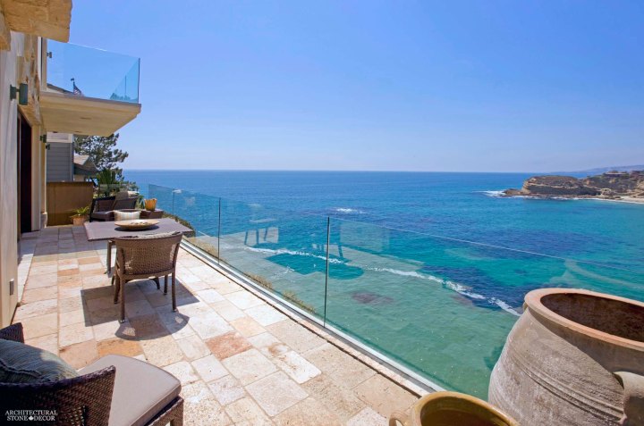 canada toronto vancouver BC CA UK coastal Mediterranean style home villa terrace balcony interior design home décor salvaged reclaimed rustic antique natural stone limestone flooring tiles