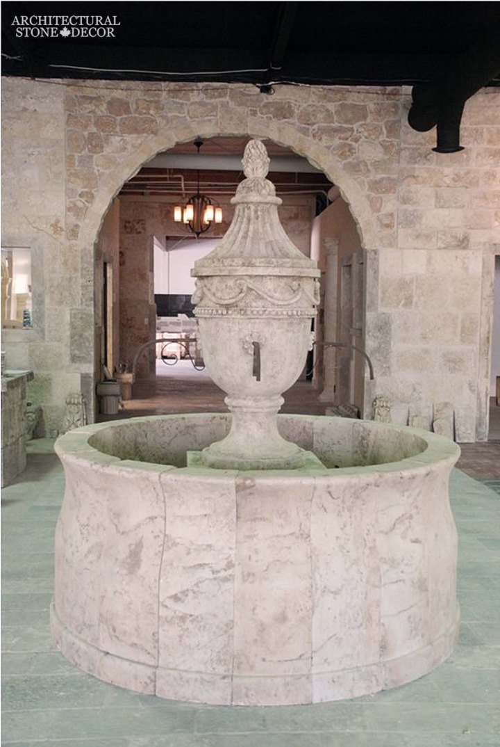 Rustic reclaimed old hand carved Tuscan Italian Mediterranean limestone natural stone pool fountain ca canada UK USA Singapore Qatar