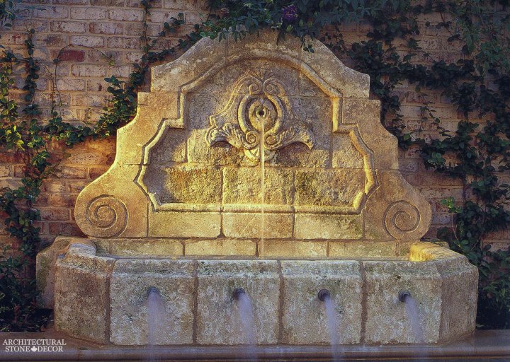 Rustic reclaimed old hand carved Tuscan Italian Mediterranean limestone natural stone wall fountain ca canada UK USA Singapore Qatar