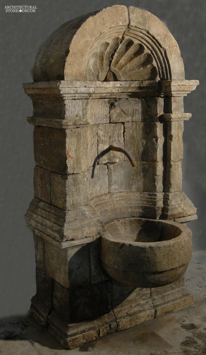 Rustic reclaimed old hand carved Tuscan Italian Mediterranean limestone natural stone wall fountain ca canada UK USA Singapore Qatar