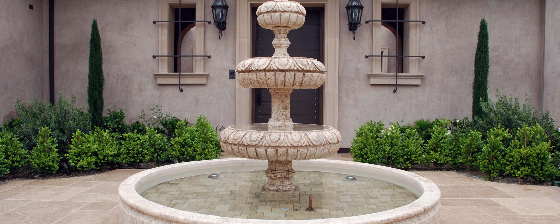 Rustic reclaimed old hand carved Tuscan Italian Mediterranean limestone natural stone pool fountain ca canada UK USA Singapore Qatar