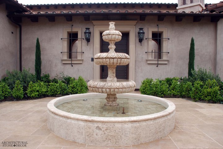 Rustic reclaimed old hand carved Tuscan Italian Mediterranean limestone natural stone pool fountain ca canada UK USA Singapore Qatar