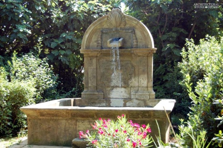 Rustic reclaimed old hand carved Tuscan Italian Mediterranean limestone natural stone wall fountain garden ca canada UK USA Singapore Qatar