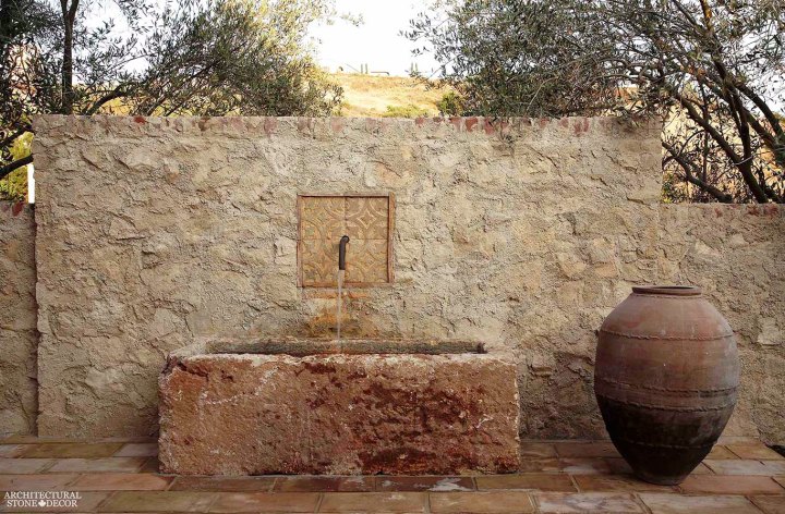 Rustic reclaimed old hand carved Tuscan Italian Mediterranean limestone natural stone wall fountain garden ca canada UK USA Singapore Qatar