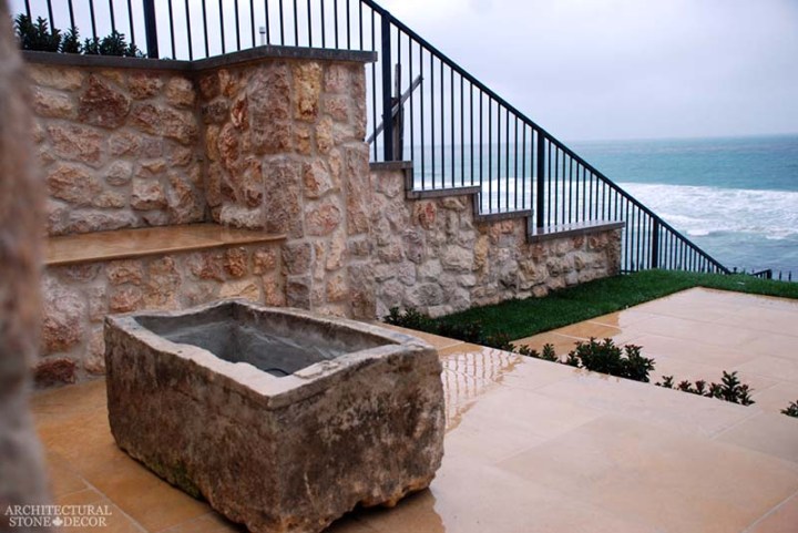 Rustic reclaimed old hand carved limestone natural stone trough fire pit terrace garden backyard ca canada
