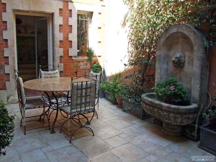 French provence terrace Rustic reclaimed old hand carved limestone natural stone wall fountain flooring ca canada bc usa