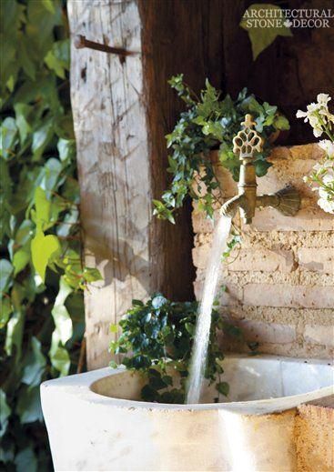 Rustic reclaimed old hand carved limestone natural stone sink outdoor kitchen terrace garden backyard ca canada USA
