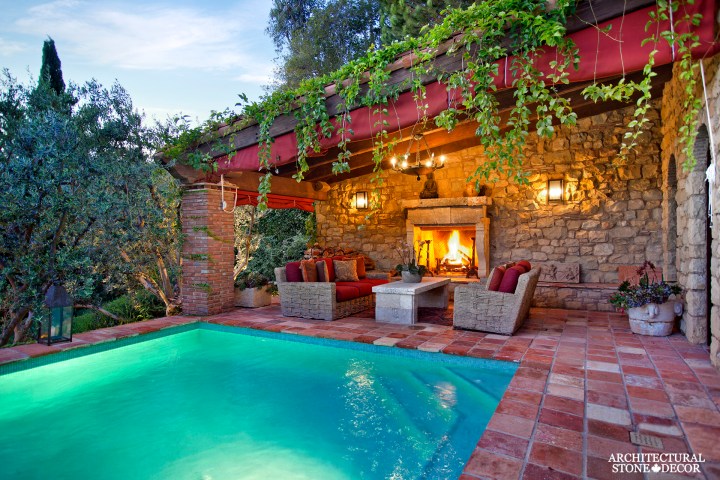 outdoor-limestone-fireplace-with-imestone-pool-coping-slab-canada