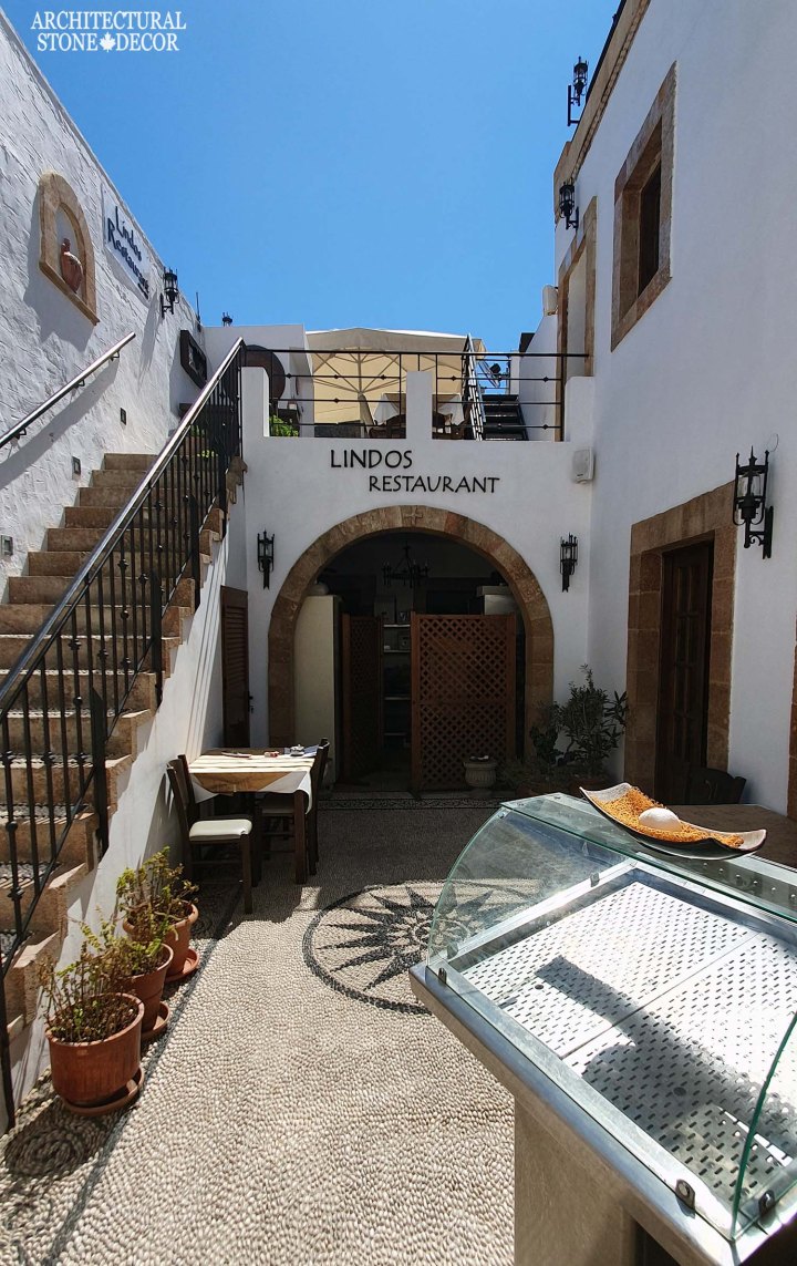 Greek old town Rhodes natural stone stair steps entryway window surround architecture home interior design Mediterranean style ca BC canada