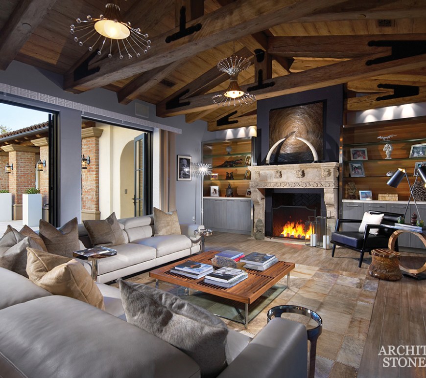 Hand carved reclaimed antiqued hunting lodge cabin interior design natural stone limestone fireplace mantel home decor canada ca uk usa