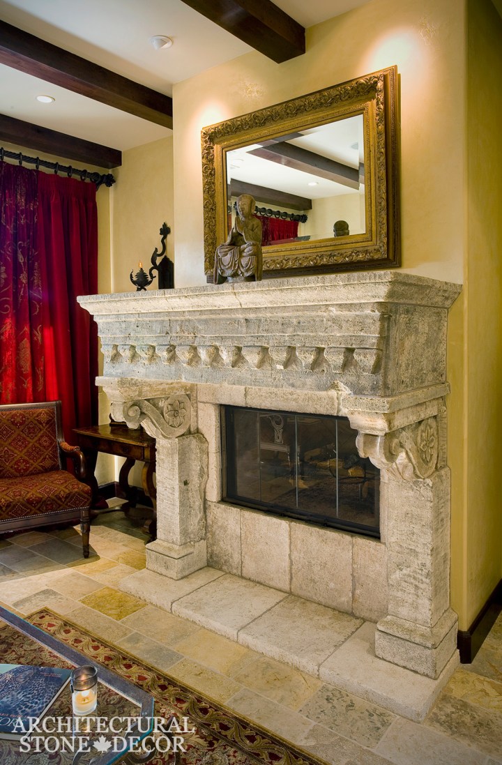 Hand carved reclaimed antiqued old world Mediterranean interior design natural stone limestone fireplace mantel home decor Canada CA UK USA BC