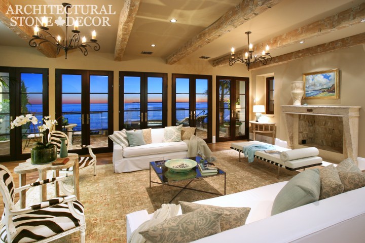 Hand carved reclaimed minimalist Tuscan Mediterranean interior design natural stone limestone fireplace mantel home decor canada ca uk usa