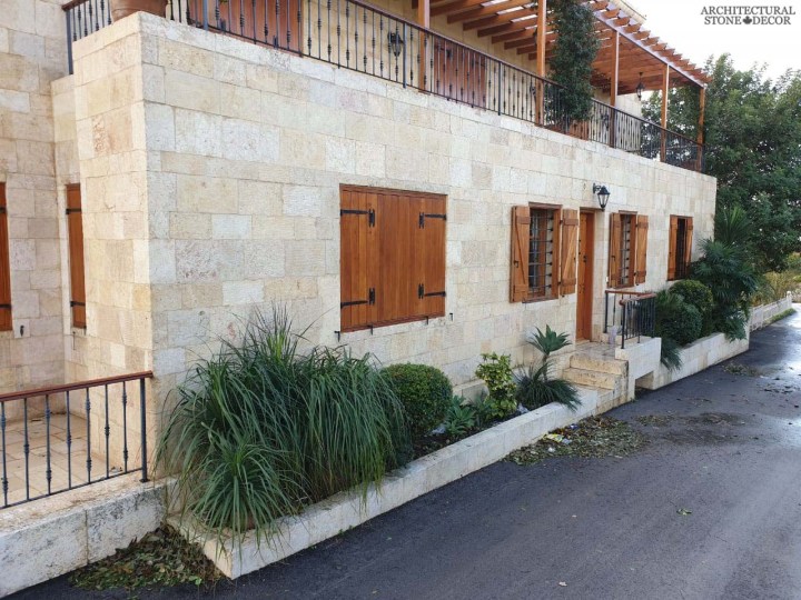 Reclaimed rustic old exterior wall cladding limestone natural stone Mediterranean home villa architecture Canada CA UK USA