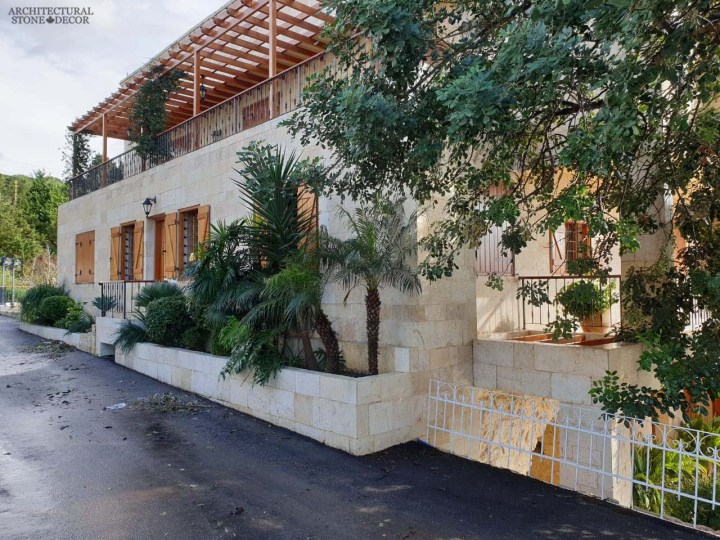Reclaimed rustic old exterior wall cladding limestone natural stone Mediterranean home villa architecture Canada CA UK USA