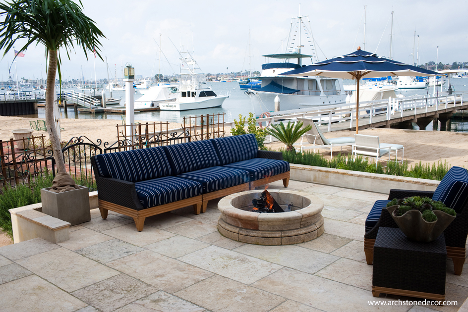 Coastal Mediterranean reclaimed Barre blonde stone flooring tiles and round fire pit landscape terrace patio design ideas